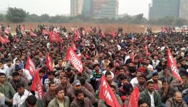 Protesting contractual staff of Honda attending a public meeting in Manesar