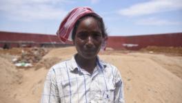 Sarojini Hajong, a labourer whose name is excluded from the final list of the NRC poses for a picture at the under-construction detention centre (Reuters)