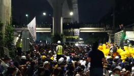 Protesters occupying the Phahon Yothin Road that leads to the 11th Infantry Regiment under the direct command of the Thai king. (Photo: Prachatai/Twitter)