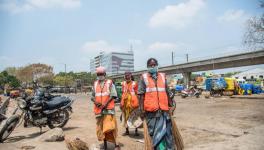 Sanitation workers.