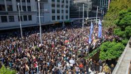 Tens of thousands of protesters, largely women, participating in the March 4 Justice rally in Sydney. (Photo: via Twitter)