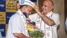 Businessman Mahesh Savani joins AAP in the presence of Delhi Deputy Chief Minister Manish Sisodia, in Surat on June 27, 2021.