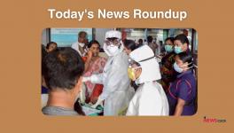 Family members of the patients admitted at the Kozhikode Medical College wear safety masks after the 'Nipah' virus outbreak, in Kozhikode.