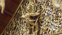 The Hindu god Narayana (or, Vishnu) on the back of a Garuda (the mount of Vishnu), depicted on one of the pediments in Wat Phra Si Rattana Satsadaram, the most sacred Buddhist temple in Thailand  