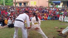 Karate instructors demonstrating self-defence at Shahid Khudiram Basu Madhyamik Sikshakendra premises on September 29, at Kelapathar village of Ranibandh Block, Bankura.