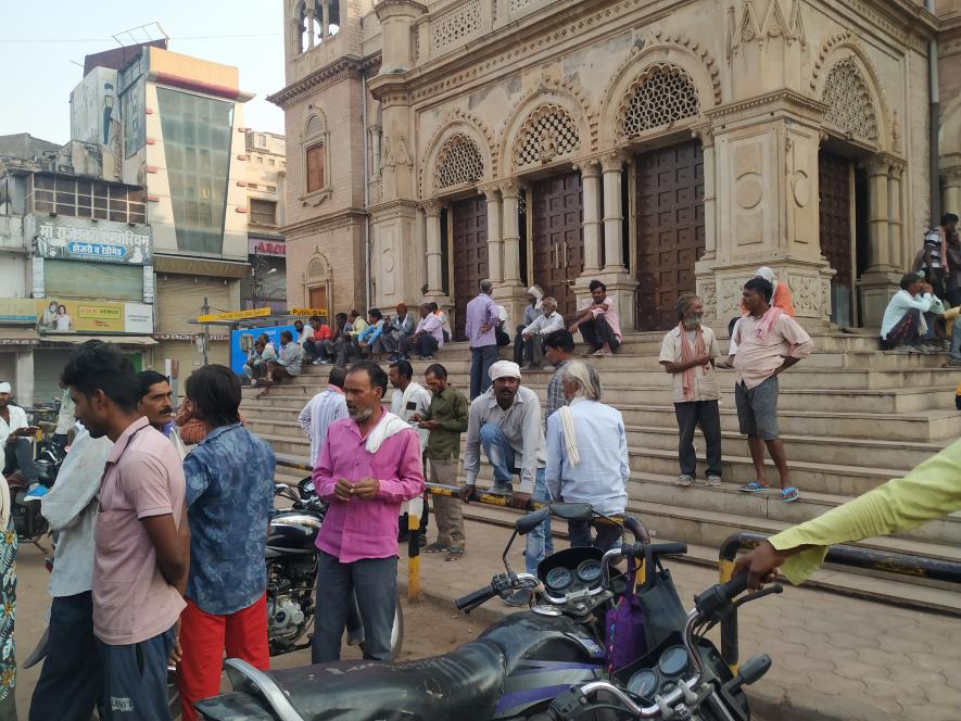 Gwalior: Donning a dusty yellow shirt with and hanging a gamcha (towel) around his neck, Ashiq Khan, A 30-year-old daily-wager and a resident of Lashkar in Gwalior district, sat meekly on the stairs of Maharaj Bada while waiting to get hired for work.     He is one of nearly 2,000 odd labourers who assemble on the stairs of Maharaj Bada, which once witnessed the glory of the Gwalior Royal Family. It has now become a centre point for daily-wage labourers. They arrive at the steps of the town hall at the crac