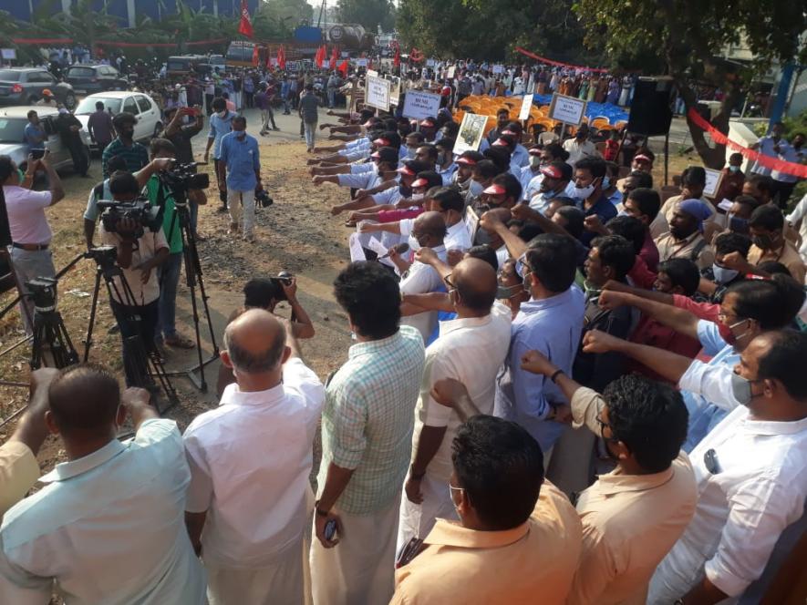 BEML employees, along with other workers, form a human fortress or protest wall in Palakkad against the privatisation of the mini ratna PSU.