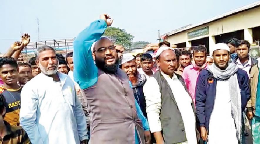 Kharupetia farmers at the protest against health minister Himanta Biswa Sarma’s comments. 