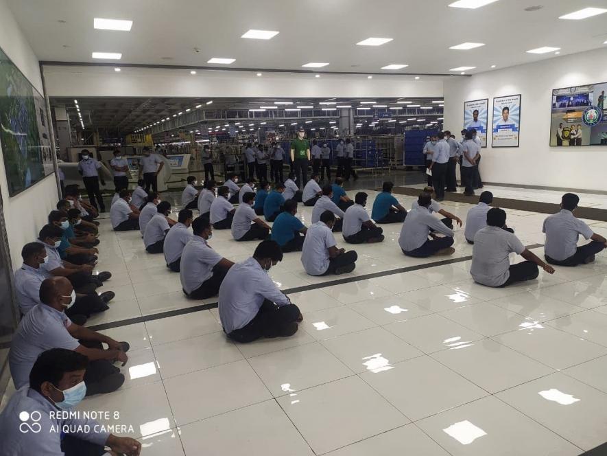 Caption: Hyundai workers protesting