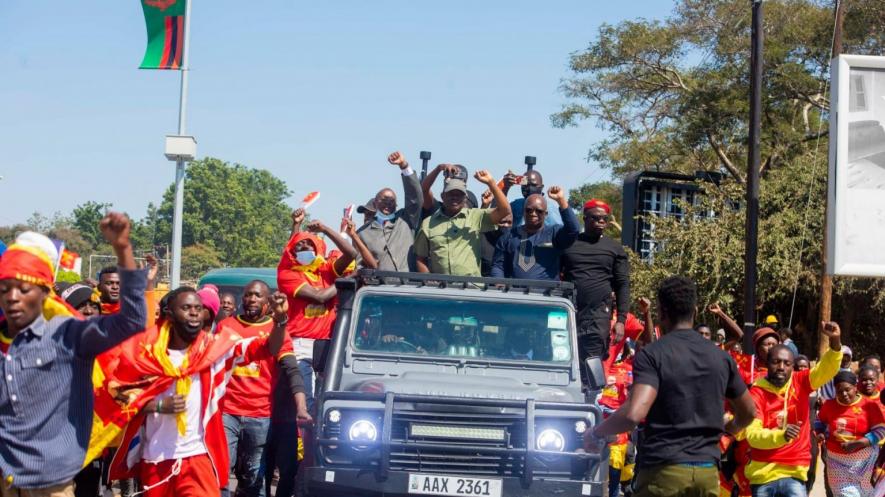 Socialist Party presidential candidate Fred M'membe (center) and other leaders of the party after the filing of nomination papers in Lusaka.