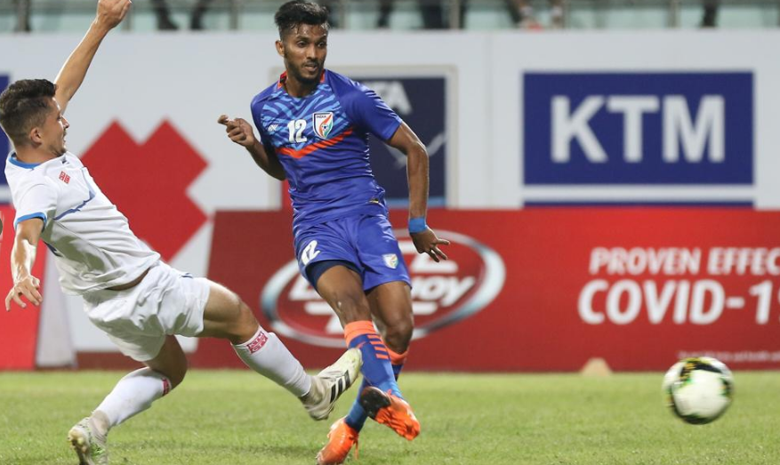 Farukh Choudhary of Indian football team scores against Nepal