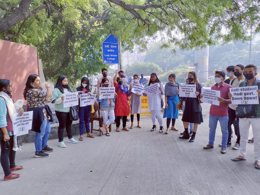 Students gathered on Monday outside of Lady Shri Ram College for a candlelight vigil. Courtesy - Special Arrangement