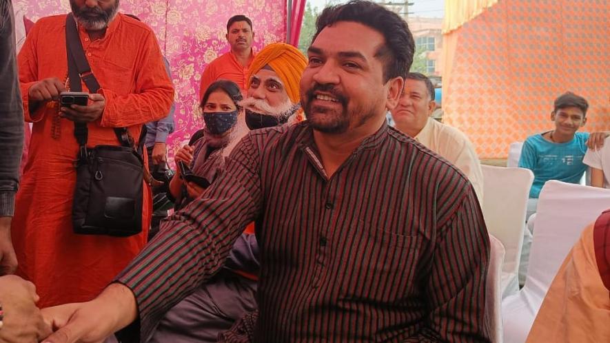 Muslims offering Friday prayers in the presence of BJP leader Kapil Mishra.