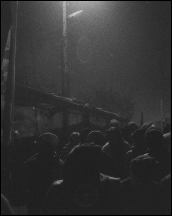 Farmers head to their tents after a chaotic evening. 