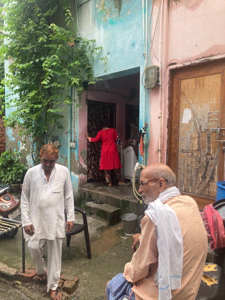 Gurudayal Singh (right) at his home