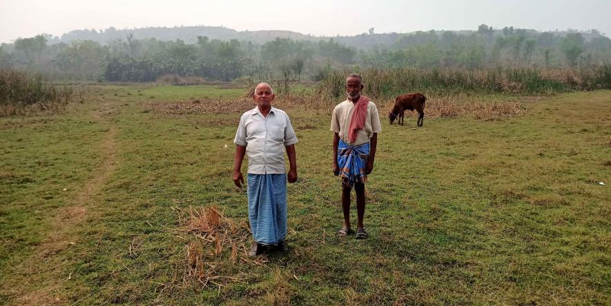 8.  santosh Khan and Amrit khan on their land which covered by soil and coal stone.