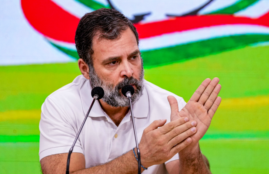 Congress leader Rahul Gandhi with party leaders KC Venugopal and Jairam Ramesh addresses a press conference at the AICC headquarters, in New Delhi, Saturday, March 25, 2023. (PTI Photo