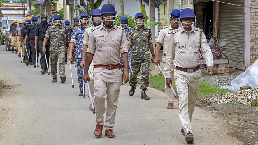 Security personnel conduct a route march in Nadia on June 22, 2023 ahead of the West Bengal panchayat elections. | Photo Credit: PTI