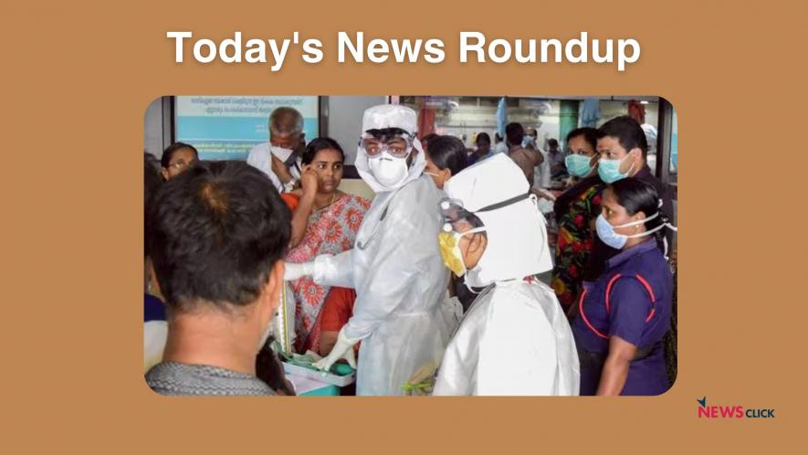 Family members of the patients admitted at the Kozhikode Medical College wear safety masks after the 'Nipah' virus outbreak, in Kozhikode.