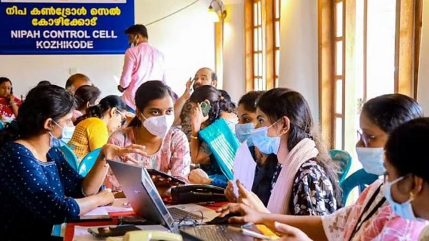 Health workers at a control room set up amid Nipah virus outbreak in Kerala, in Kozhikode, Thursday, Sept. 14, 2023. 