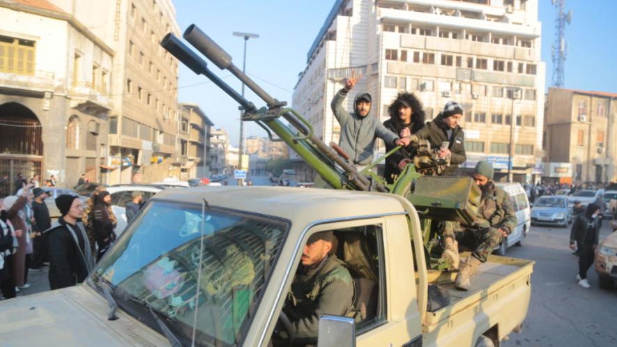 Syrian terrorist groups led by Mohammed al-Julani (former Al Qaeda leader) taking over Damascus. Photo via The New Arab